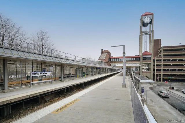 a view of a balcony with chairs