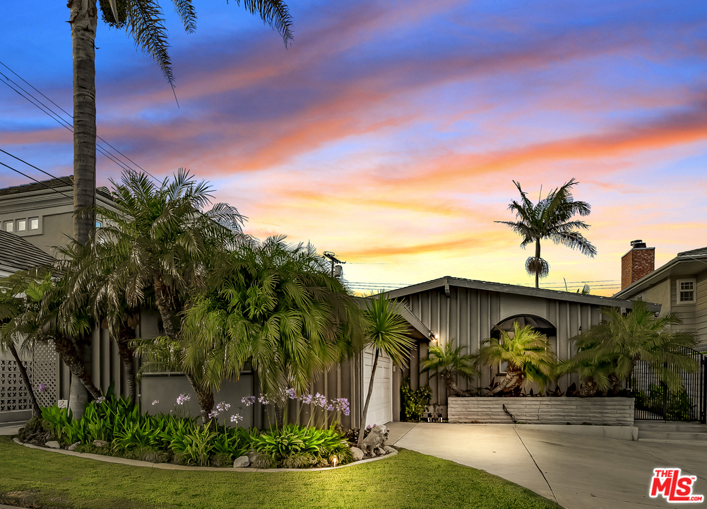 8257 Rees Street Playa del Rey, CA 90293 - Photo 2 of 40 a front view of a house with garden