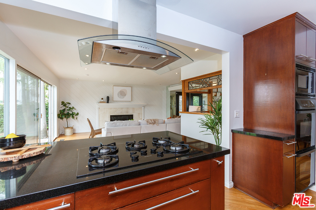 8257 Rees Street Playa del Rey, CA 90293 - Photo 12 of 40 a kitchen with a stove and a refrigerator