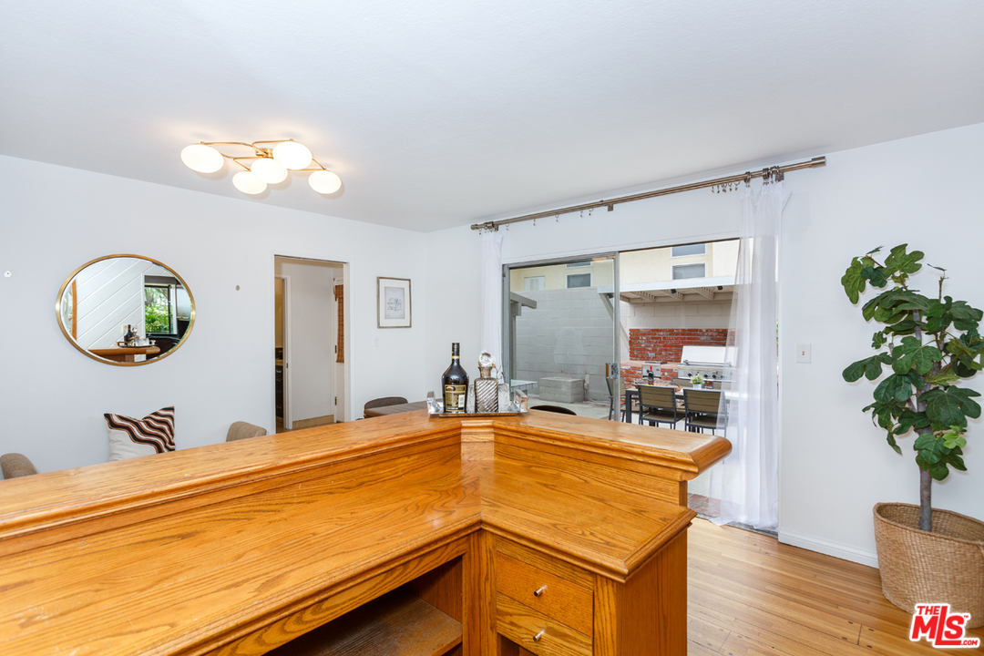 8257 Rees Street Playa del Rey, CA 90293 - Photo 15 of 40 a room with pool table and potted plants