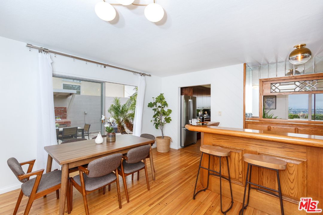 8257 Rees Street Playa del Rey, CA 90293 - Photo 17 of 40 a dining room with furniture and window