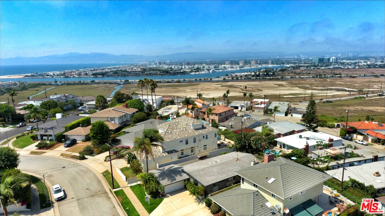 8257 Rees Street Playa del Rey, CA 90293 - Photo 3 of 40 an aerial view of a city with lots of residential buildings ocean and mountain view in back