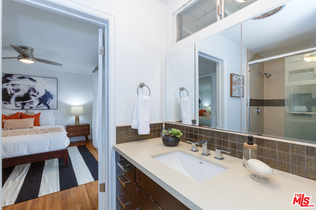 8257 Rees Street Playa del Rey, CA 90293 - Photo 21 of 40 a bathroom with a sink and a mirror