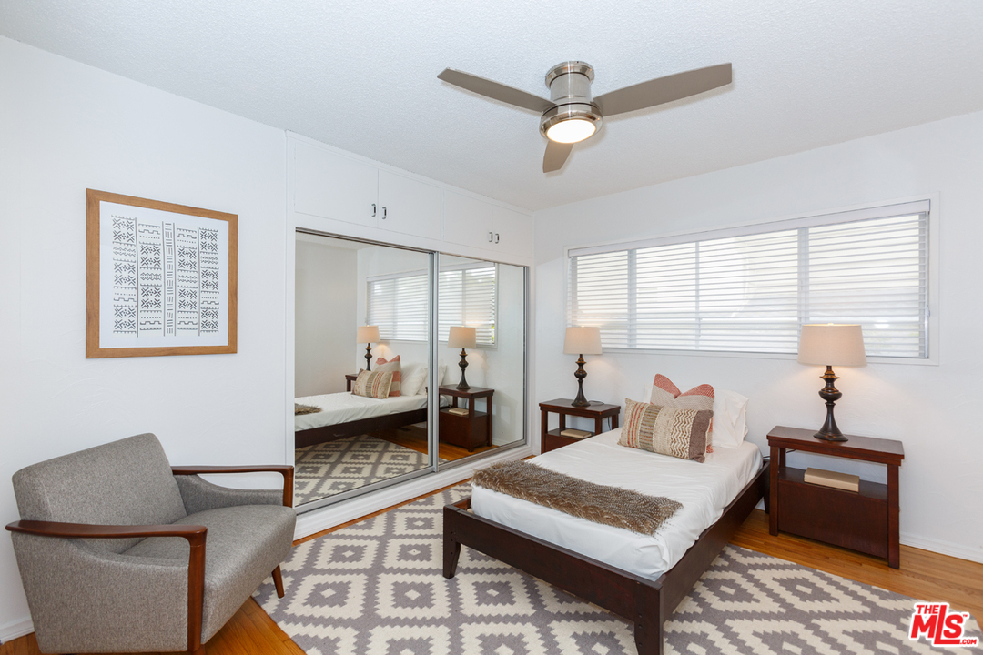 8257 Rees Street Playa del Rey, CA 90293 - Photo 22 of 40 a living room with furniture and a wooden floor