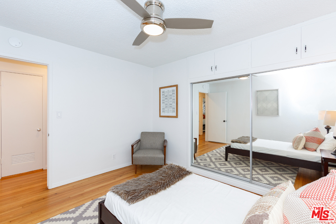 8257 Rees Street Playa del Rey, CA 90293 - Photo 23 of 40 a living room with furniture and a wooden floor