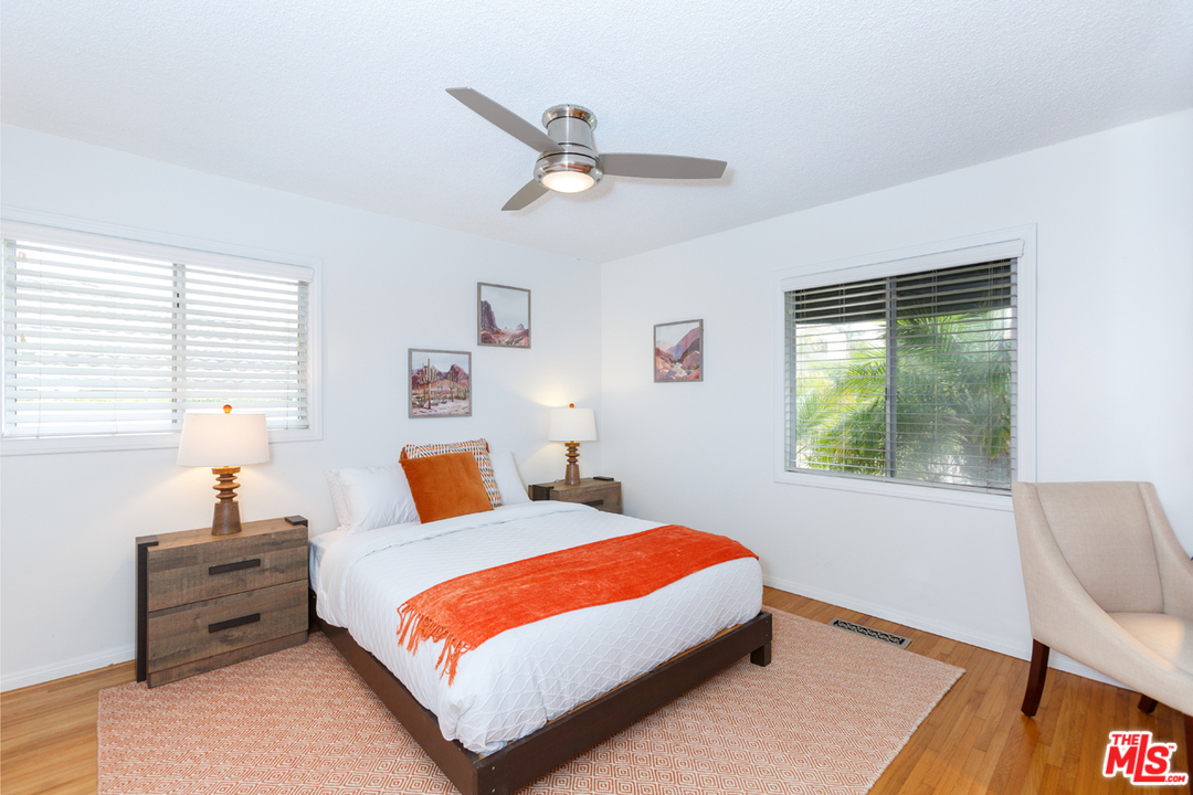 8257 Rees Street Playa del Rey, CA 90293 - Photo 24 of 40 a bedroom with a bed and window