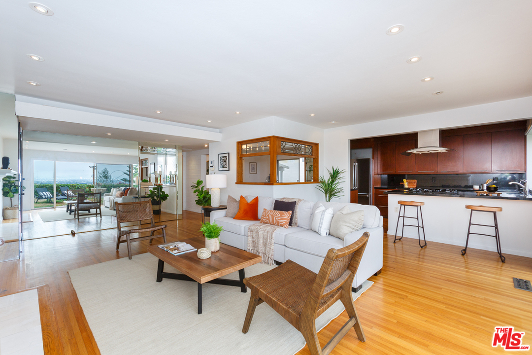 8257 Rees Street Playa del Rey, CA 90293 - Photo 6 of 40 a living room with furniture and kitchen view