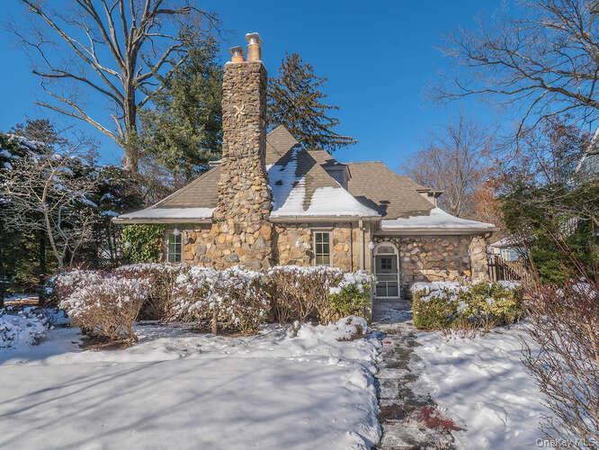 a view of a house with a garden