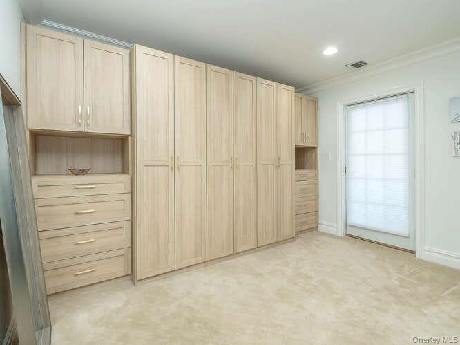 23 Ivy Way Port Washington, NY 11050 - Photo 24 of 47 an empty room with closet area