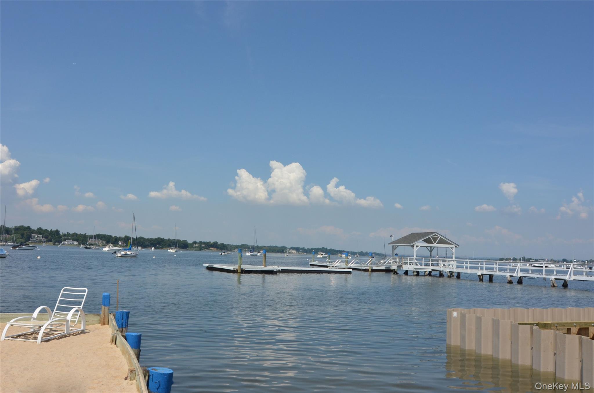 23 Ivy Way Port Washington, NY 11050 - Photo 45 of 47 a view of a lake and outdoor space