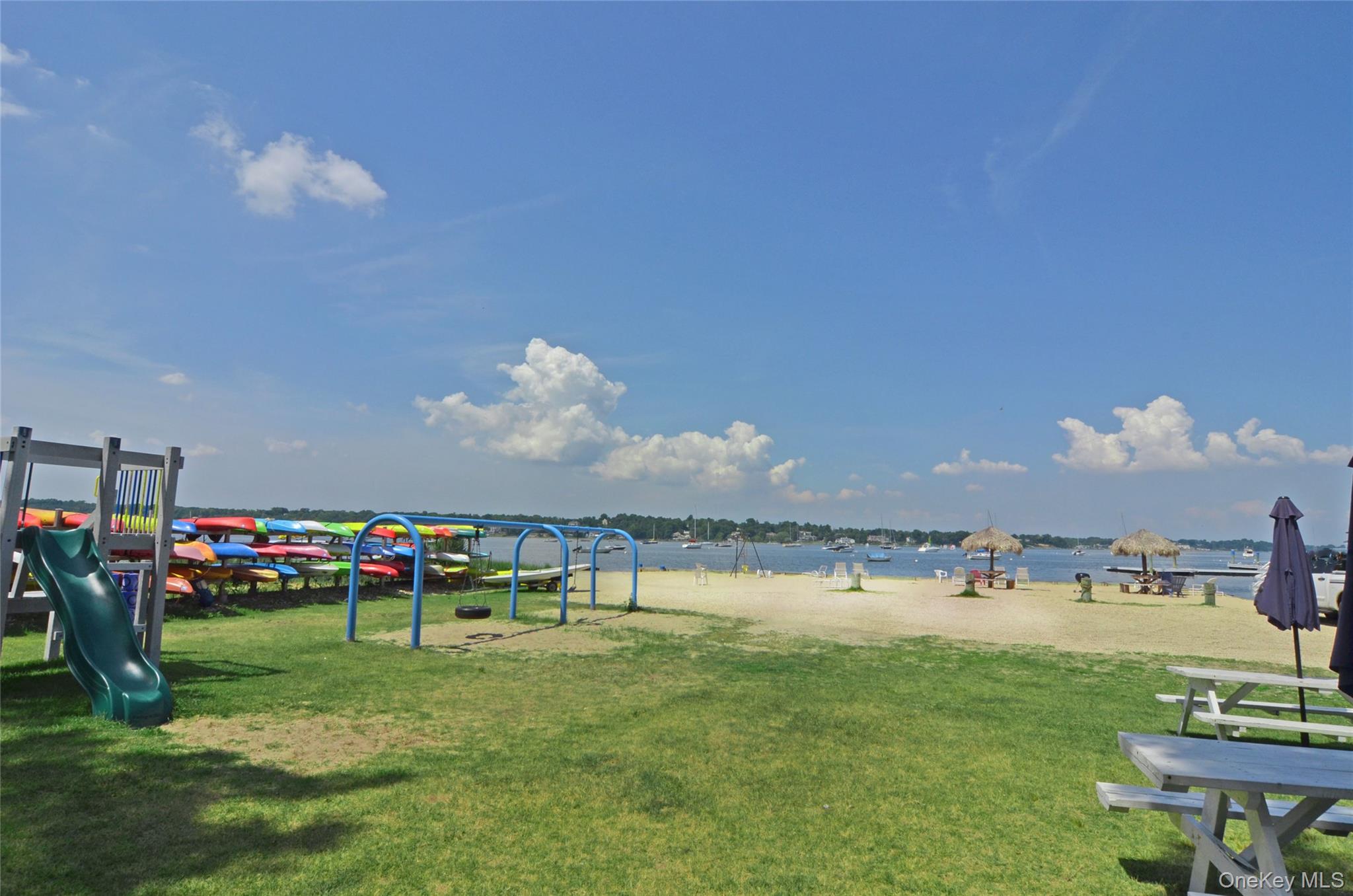 23 Ivy Way Port Washington, NY 11050 - Photo 46 of 47 a view of a golf course with chairs