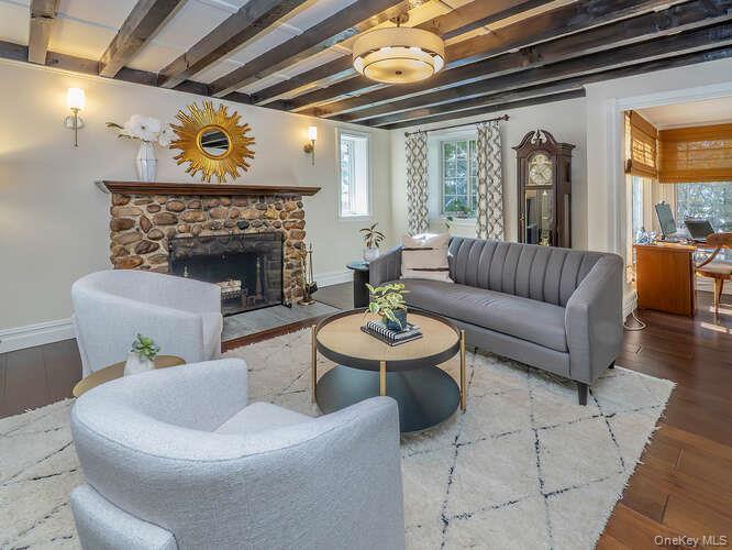 23 Ivy Way Port Washington, NY 11050 - Photo 6 of 47 a living room with furniture and a fireplace