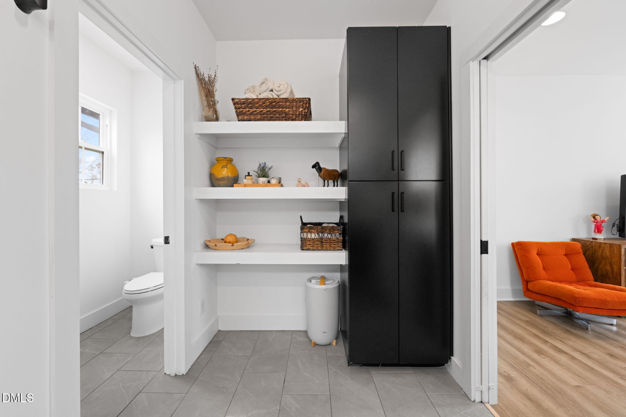 320 South Tarboro Street Raleigh, NC 27610 - Photo 22 of 54 a kitchen with a refrigerator and cabinets