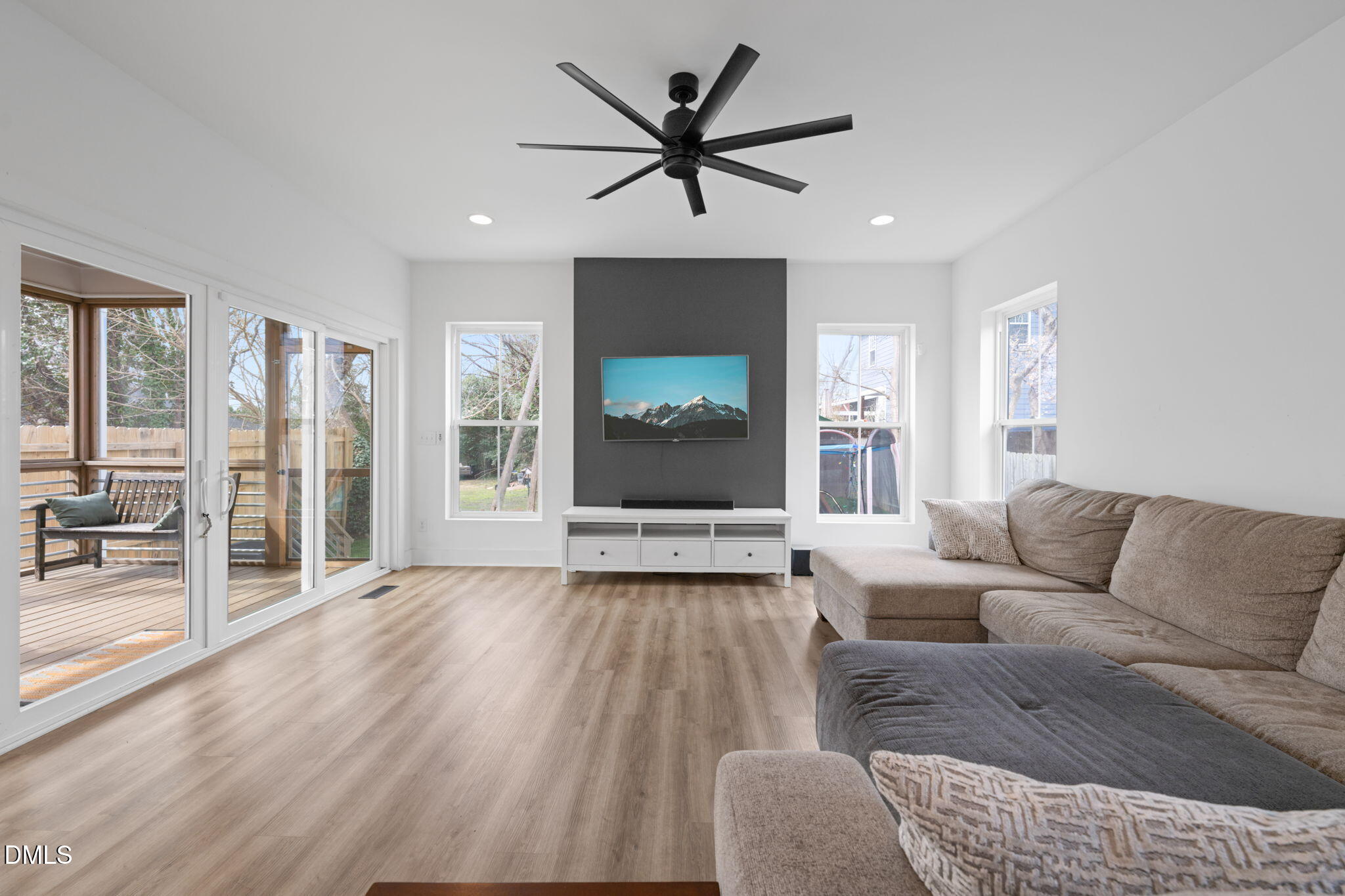 320 South Tarboro Street Raleigh, NC 27610 - Photo 49 of 54 a living room with furniture and a large window