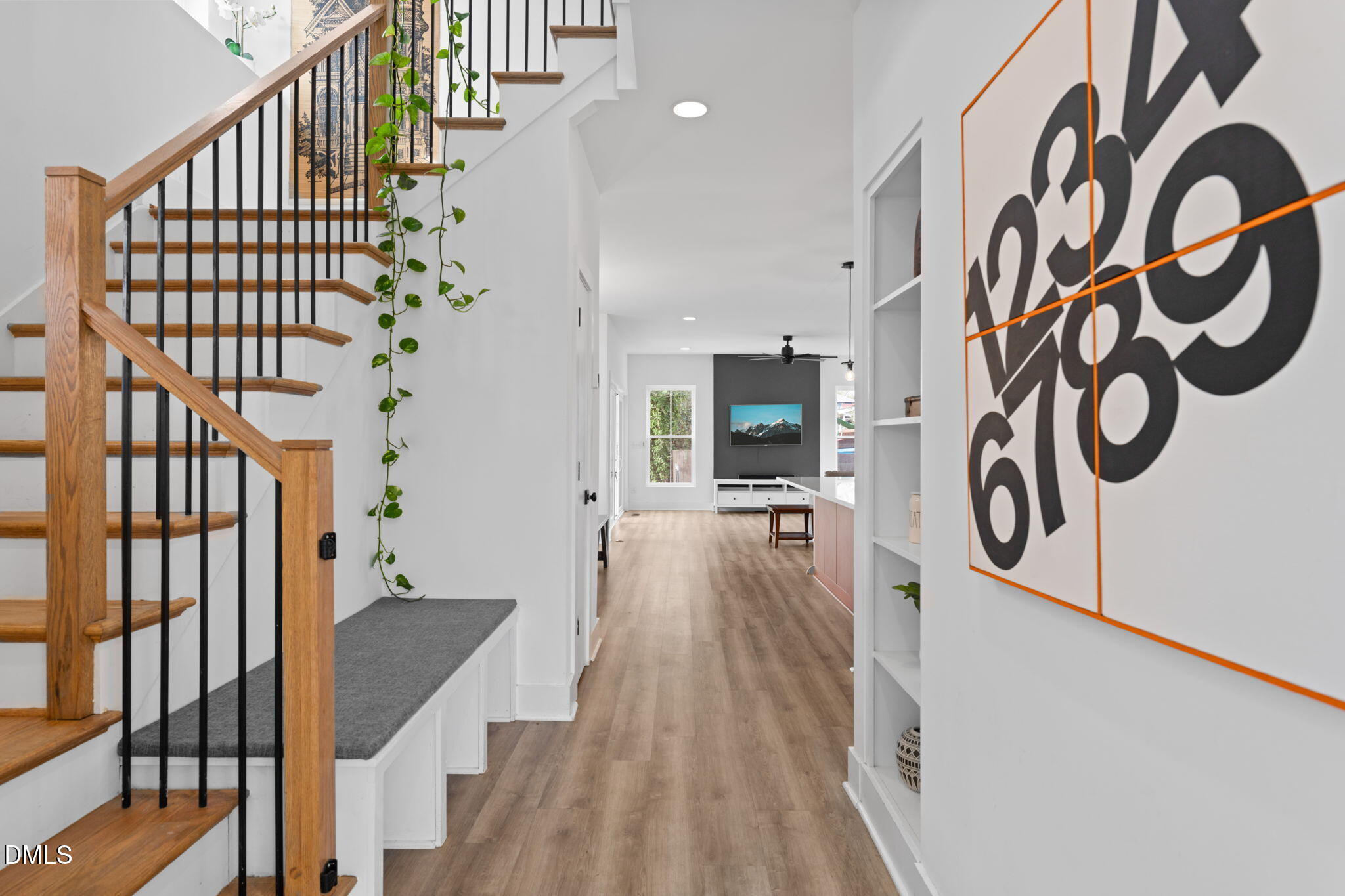 320 South Tarboro Street Raleigh, NC 27610 - Photo 9 of 54 a view of entryway with wooden floor