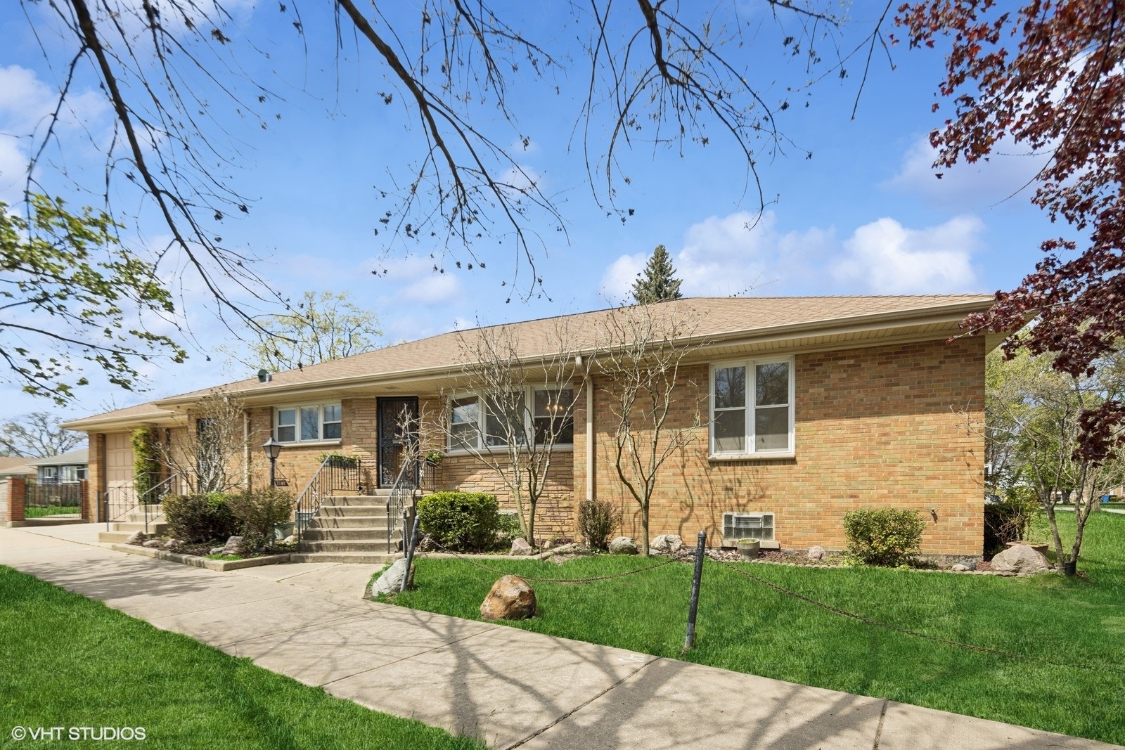 7010 West Devon Avenue Chicago, IL 60631 - Photo 2 of 51 front view of house with a yard