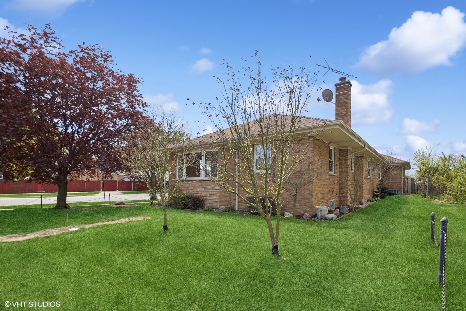 7010 West Devon Avenue Chicago, IL 60631 - Photo 3 of 51 a backyard of a house with lots of green space
