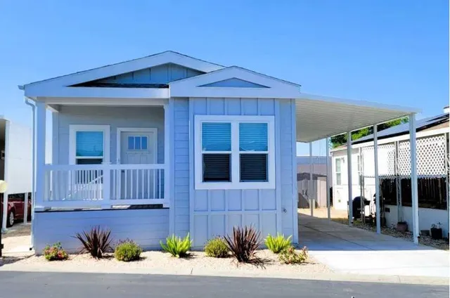 a view of a house with a garden