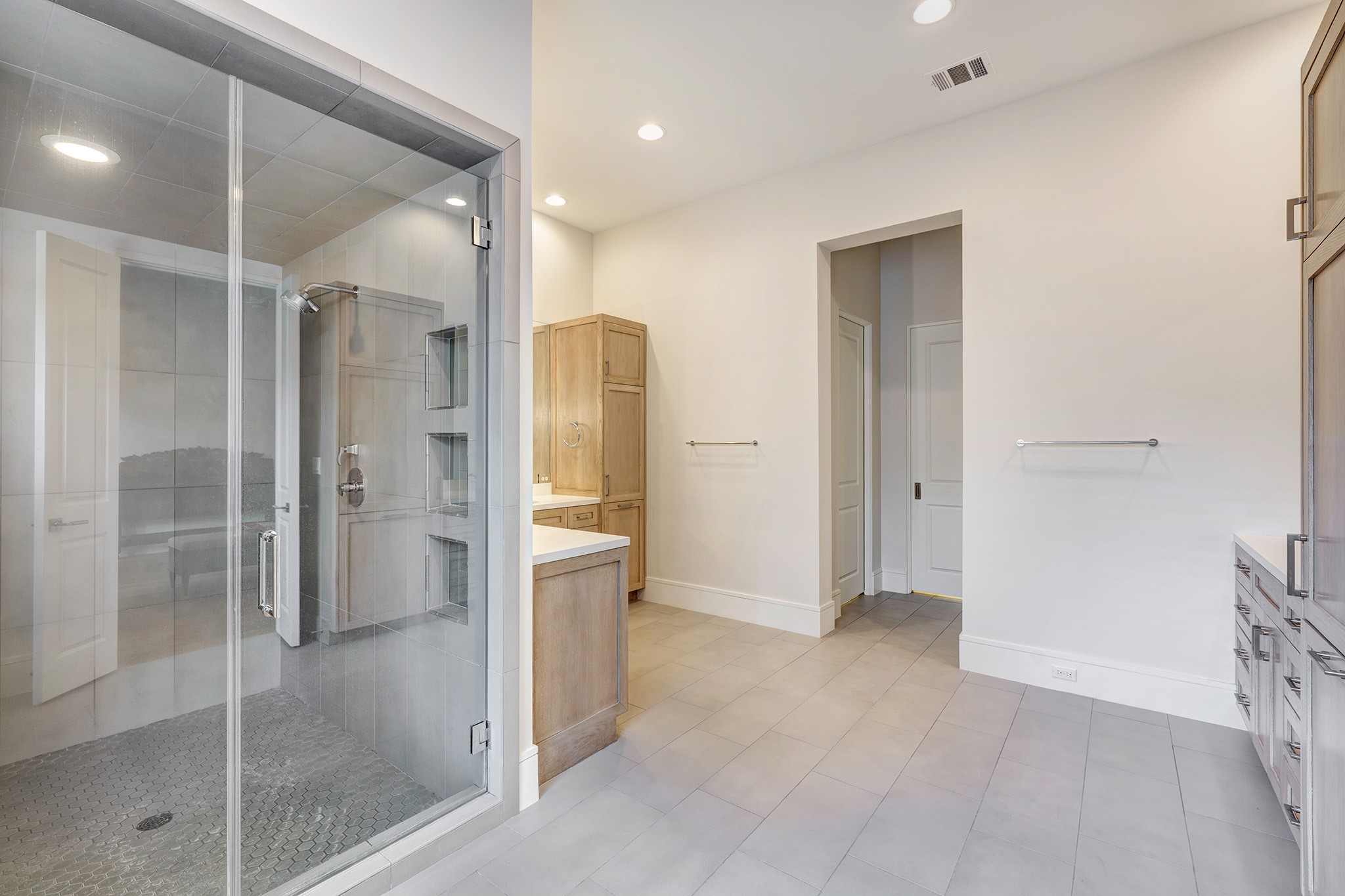 247 Piney Point Road Piney Point Village, TX 77024 - Photo 19 of 40 a bathroom with a shower and a glass door