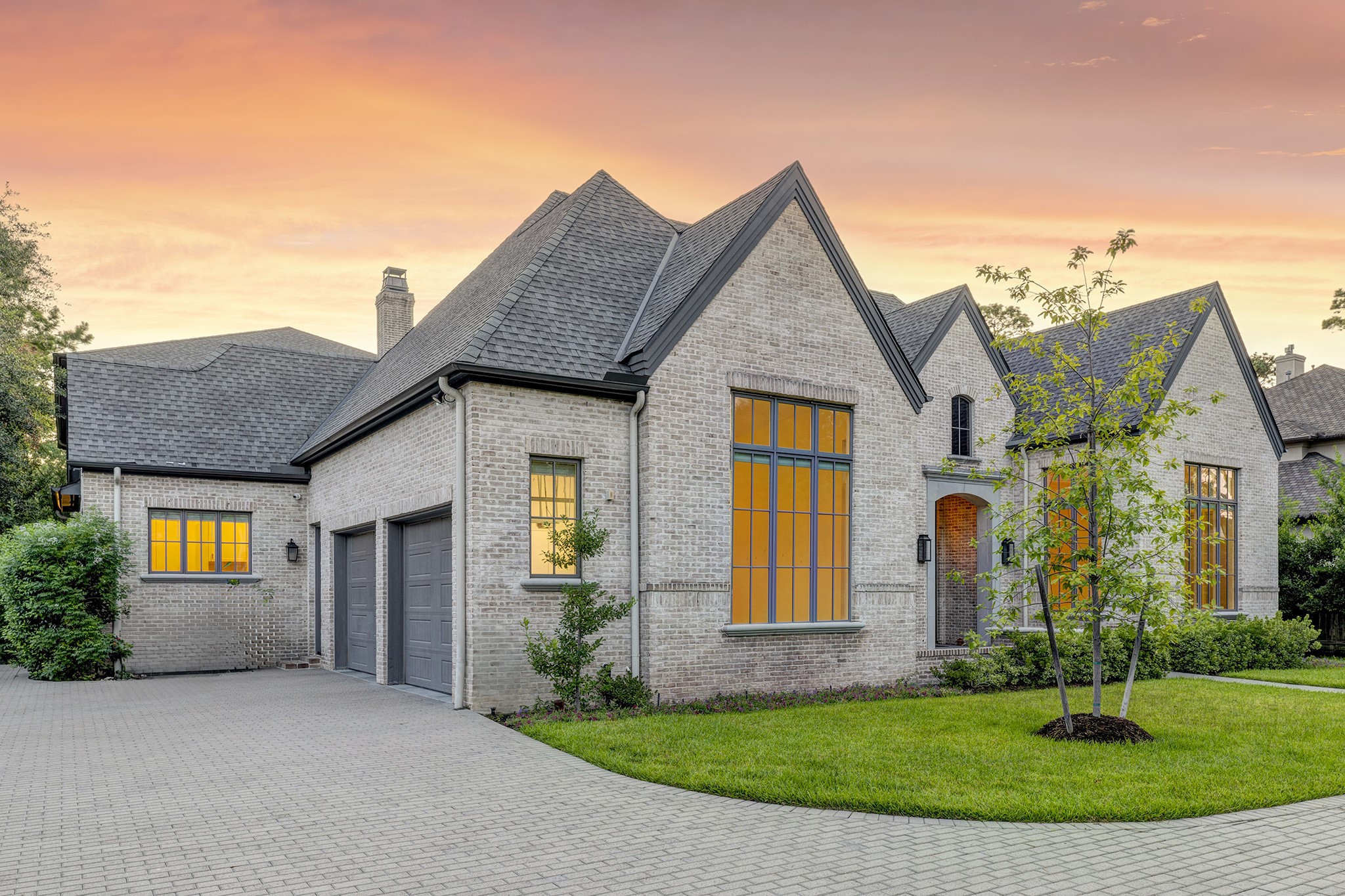 247 Piney Point Road Piney Point Village, TX 77024 - Photo 2 of 40 a front view of a house with a yard