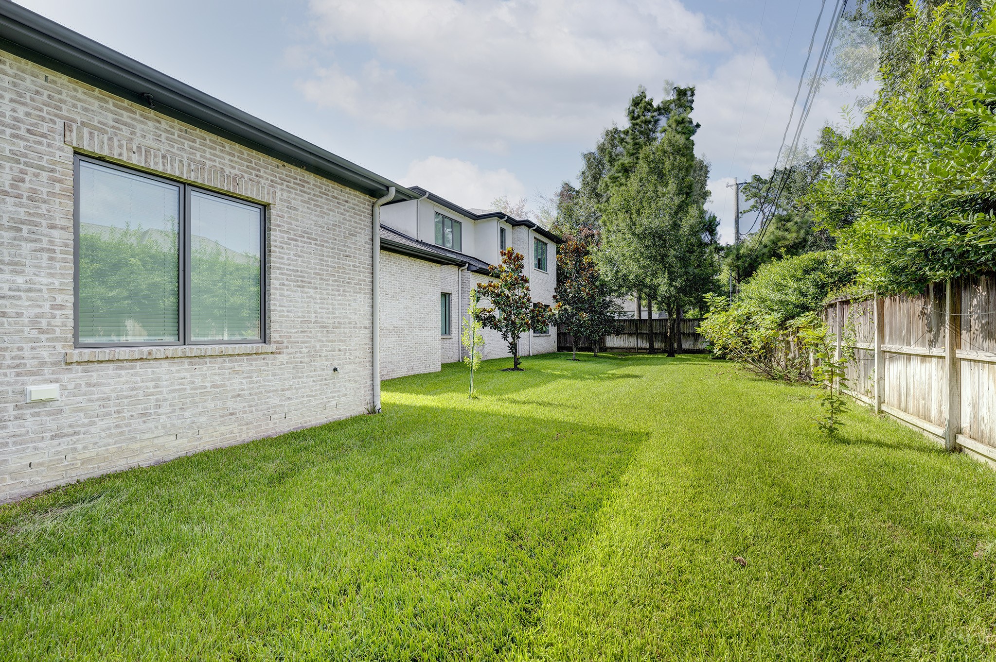 247 Piney Point Road Piney Point Village, TX 77024 - Photo 36 of 40 a view of house with backyard