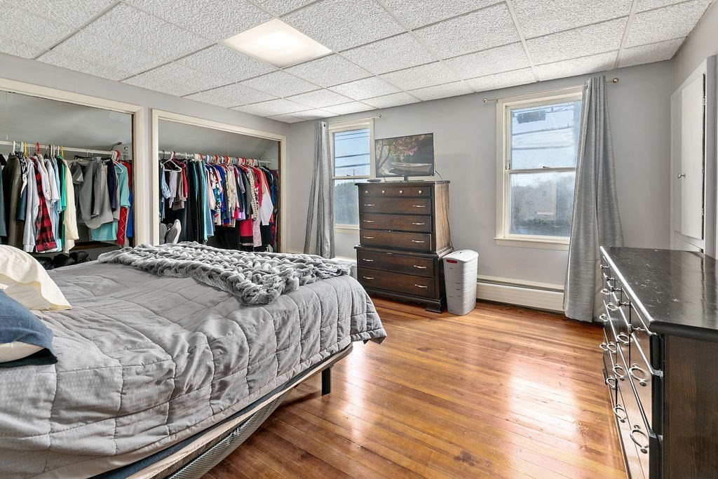 524 Merrimack Street Methuen, MA 01844 - Photo 18 of 34 a bed room with a bed and a window