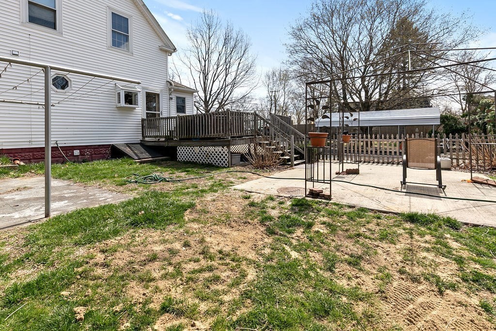 524 Merrimack Street Methuen, MA 01844 - Photo 22 of 34 a view of a house with a yard