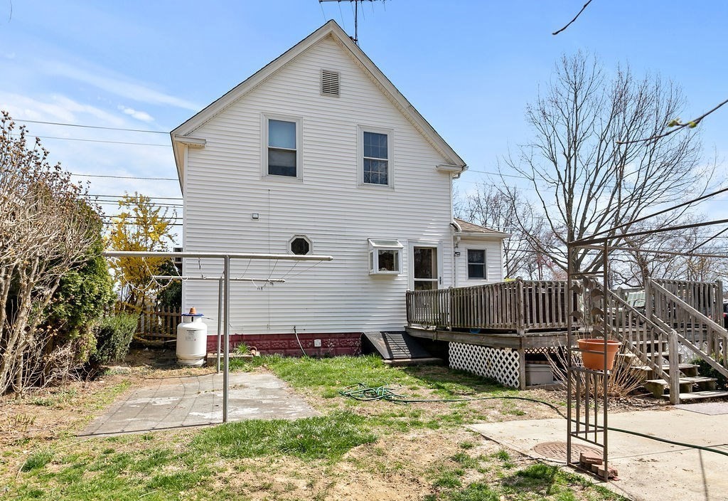 524 Merrimack Street Methuen, MA 01844 - Photo 23 of 34 a view of a house with a yard
