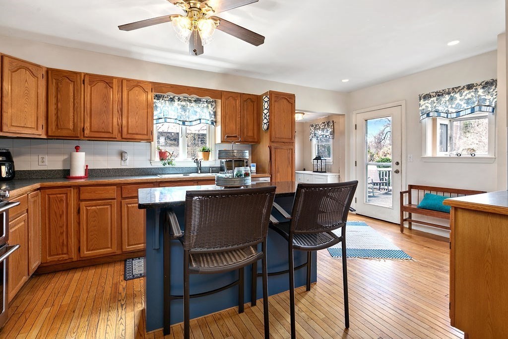 524 Merrimack Street Methuen, MA 01844 - Photo 4 of 34 a view of a dining room with furniture window and wooden floor