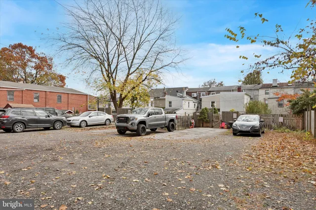 a view of backyard with a patio and a garden