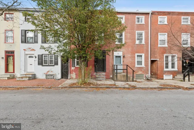 a front view of a building with street view