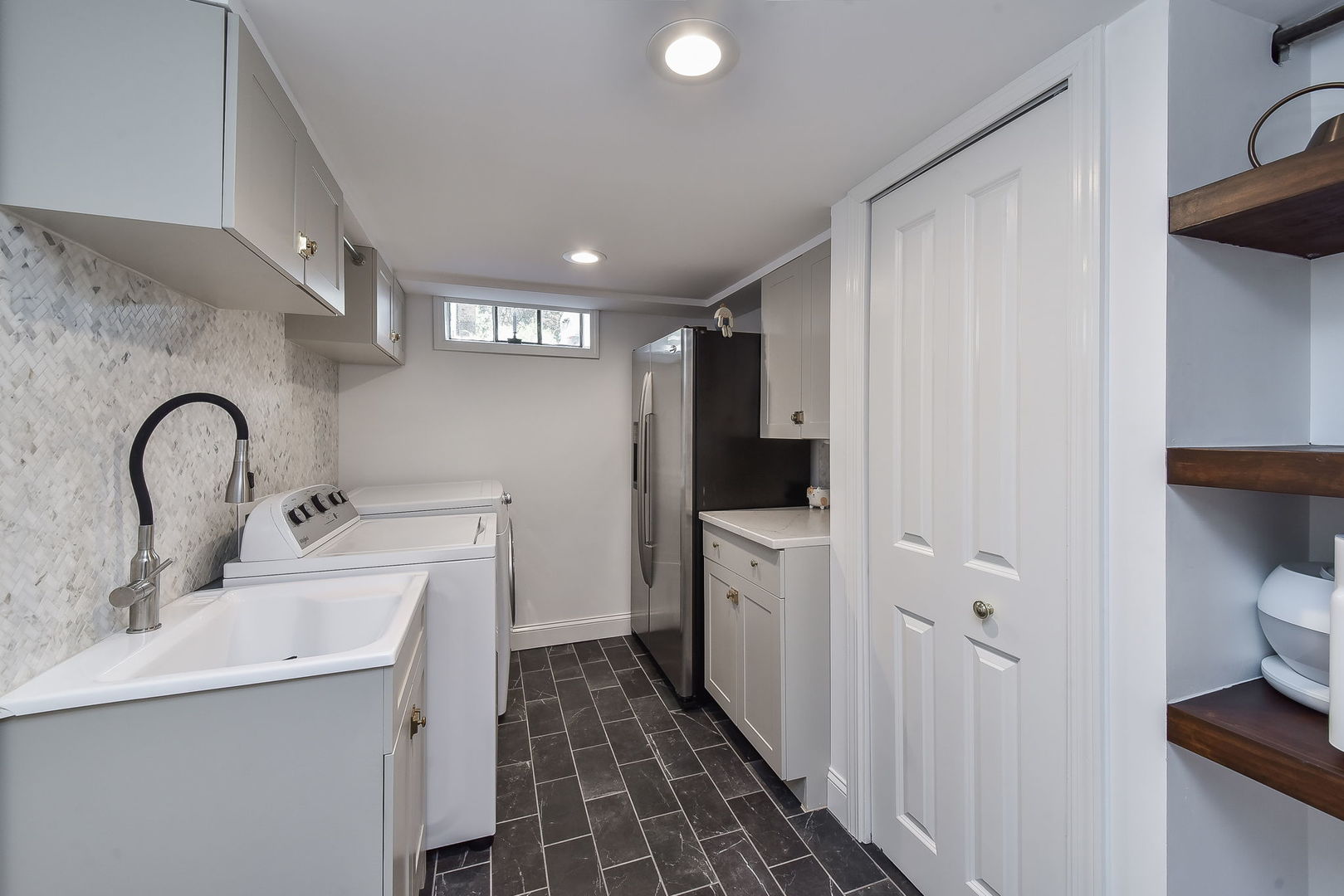 808 Anderson Boulevard Geneva, IL 60134 - Photo 22 of 30 a kitchen with a sink and a refrigerator