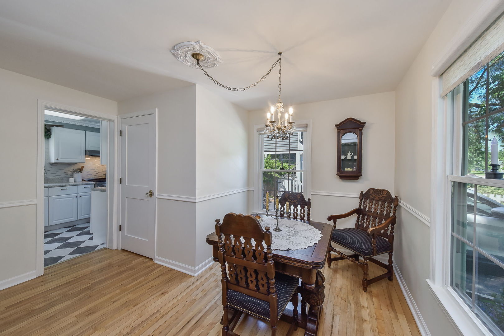 808 Anderson Boulevard Geneva, IL 60134 - Photo 8 of 30 a view of a dining room with furniture and chandelier