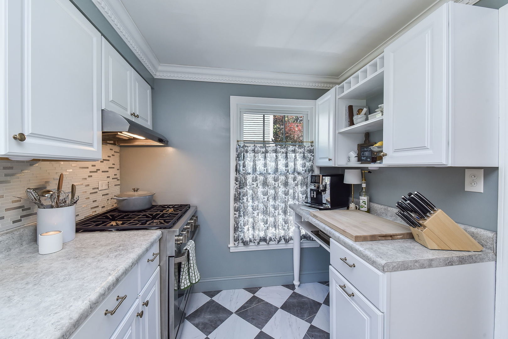 808 Anderson Boulevard Geneva, IL 60134 - Photo 10 of 30 a kitchen with a sink stove top oven and cabinets