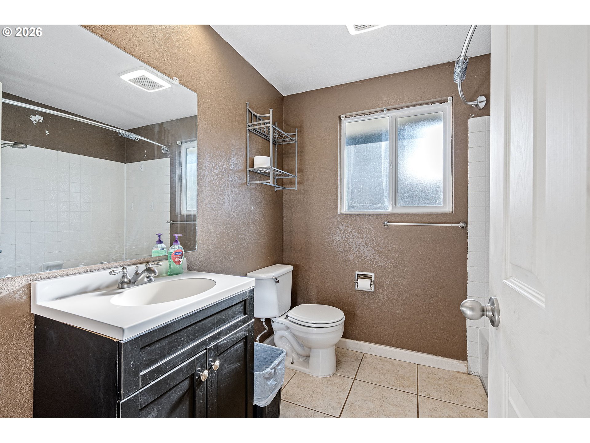 775 54th Street Springfield, OR 97478 - Photo 13 of 31 a bathroom with a sink toilet and a mirror