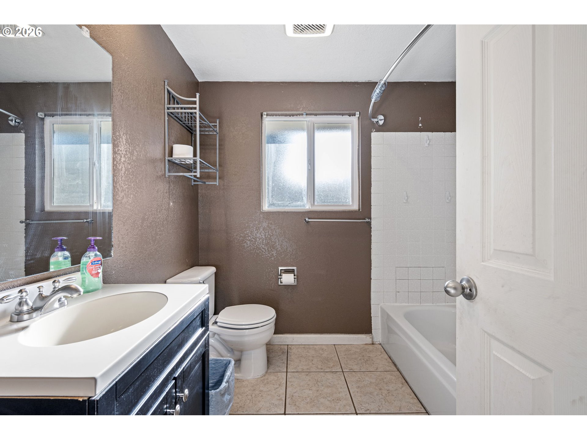 775 54th Street Springfield, OR 97478 - Photo 14 of 31 a bathroom with a sink a toilet and shower