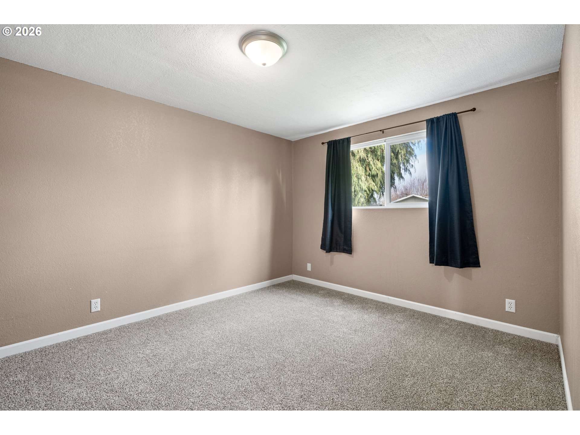 775 54th Street Springfield, OR 97478 - Photo 17 of 31 a view of an empty room with a window
