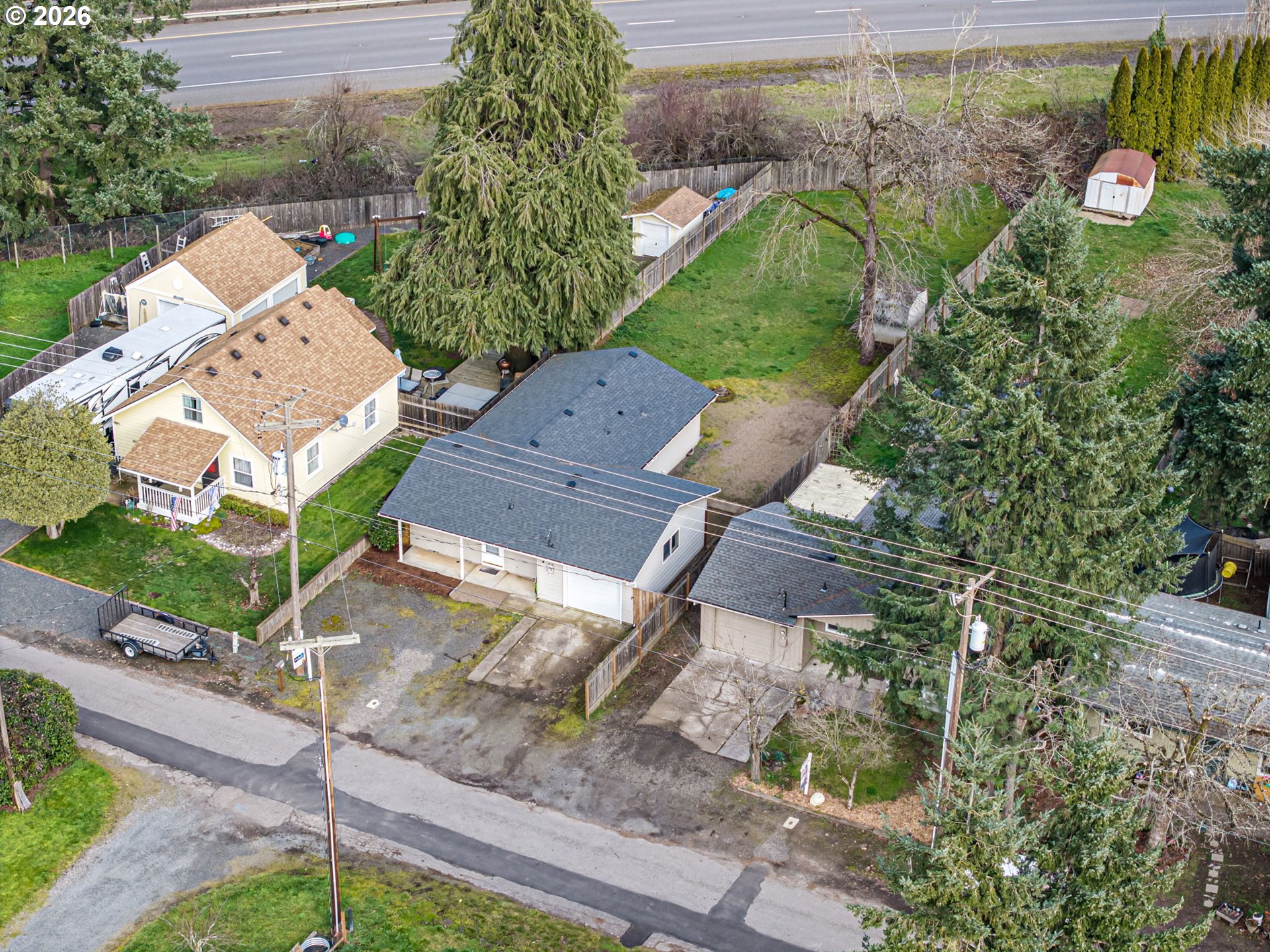 775 54th Street Springfield, OR 97478 - Photo 30 of 31 an aerial view of a house with a yard and garden