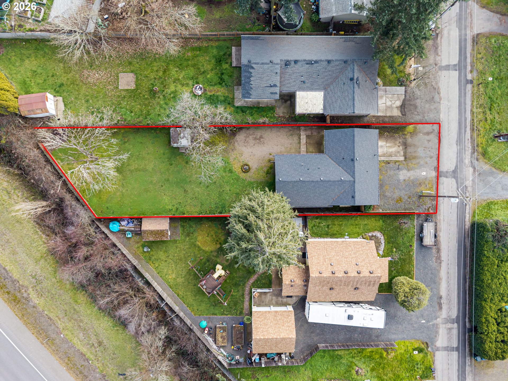 775 54th Street Springfield, OR 97478 - Photo 31 of 31 an aerial view of a house with a yard