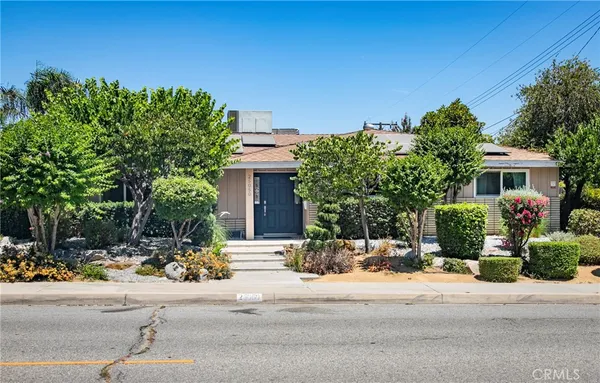 front view of a house with a street