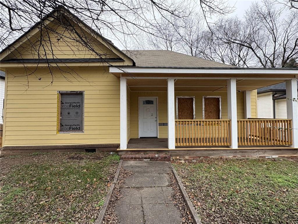 655 Hugh Street Southwest Atlanta, GA 30310 - Photo 1 of 1 a front view of a house