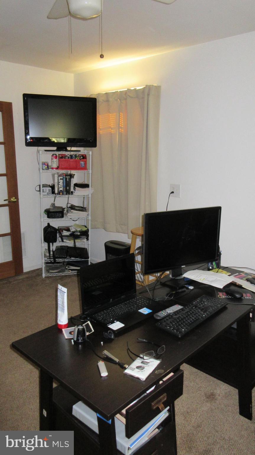 8202 Grainfield Road Severn, MD 21144 - Photo 12 of 37 In law bedroom currently home office