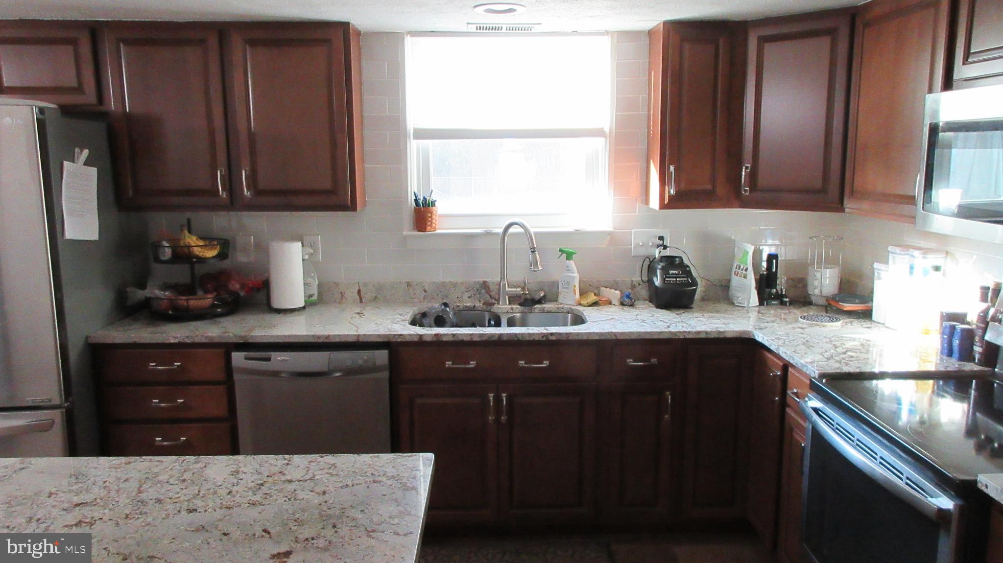 8202 Grainfield Road Severn, MD 21144 - Photo 18 of 37 Natural light on your granite island