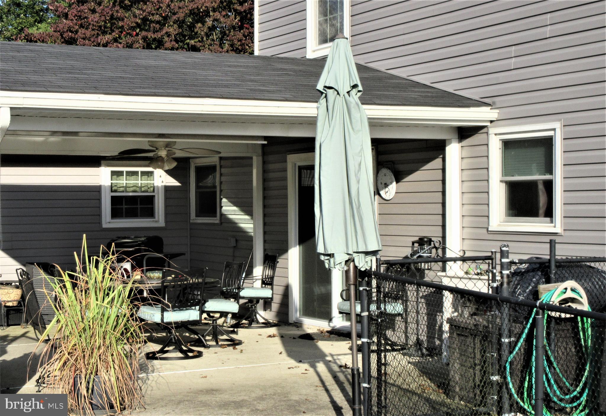 8202 Grainfield Road Severn, MD 21144 - Photo 33 of 37 Covered patio overlooks pool