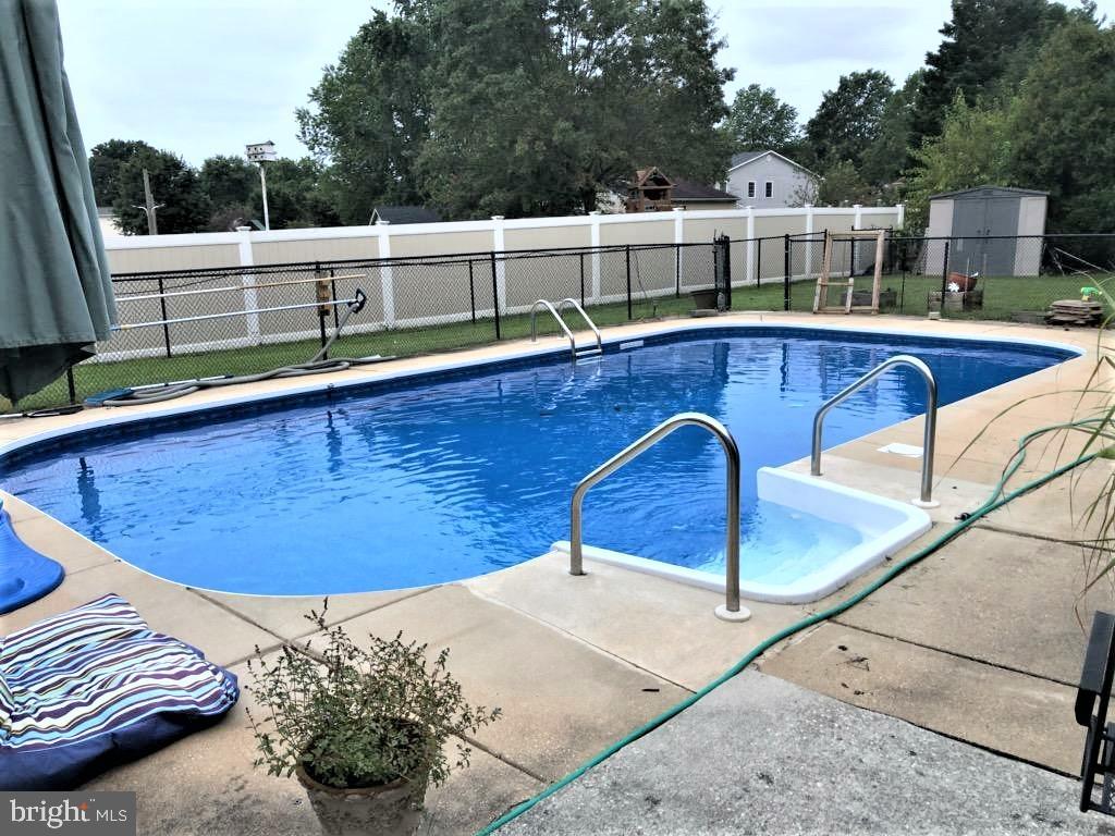 8202 Grainfield Road Severn, MD 21144 - Photo 34 of 37 Gorgeous low maintenance built in pool!