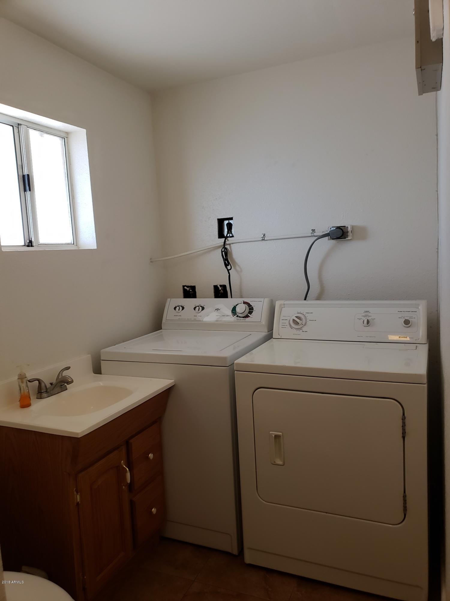 334 West Piedmont Road Phoenix, AZ 85041 - Photo 14 of 36 Bonus Room Laundry