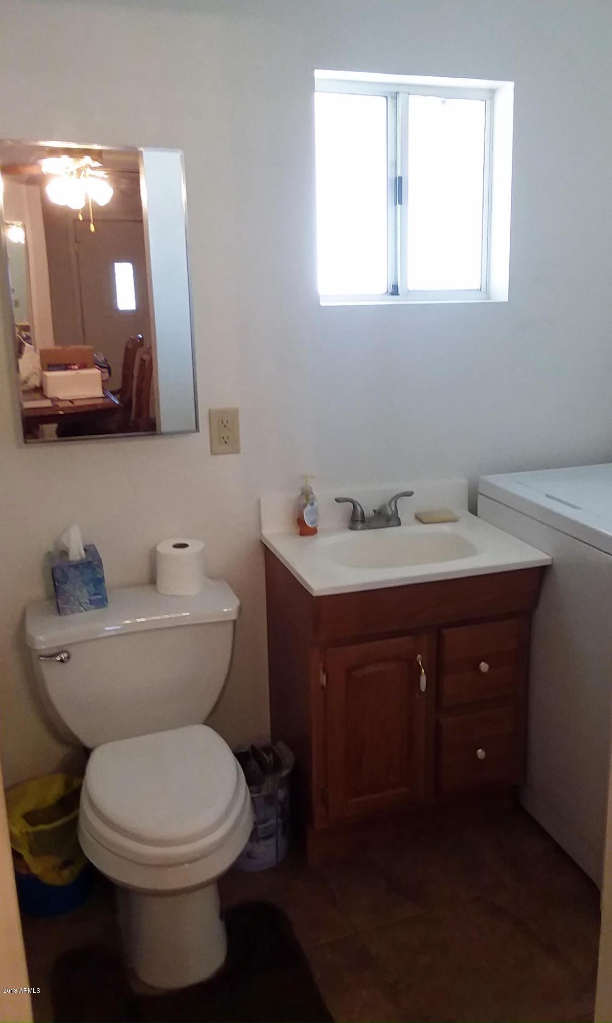 334 West Piedmont Road Phoenix, AZ 85041 - Photo 15 of 36 Bonus Room w/ toilet, shower, & sink