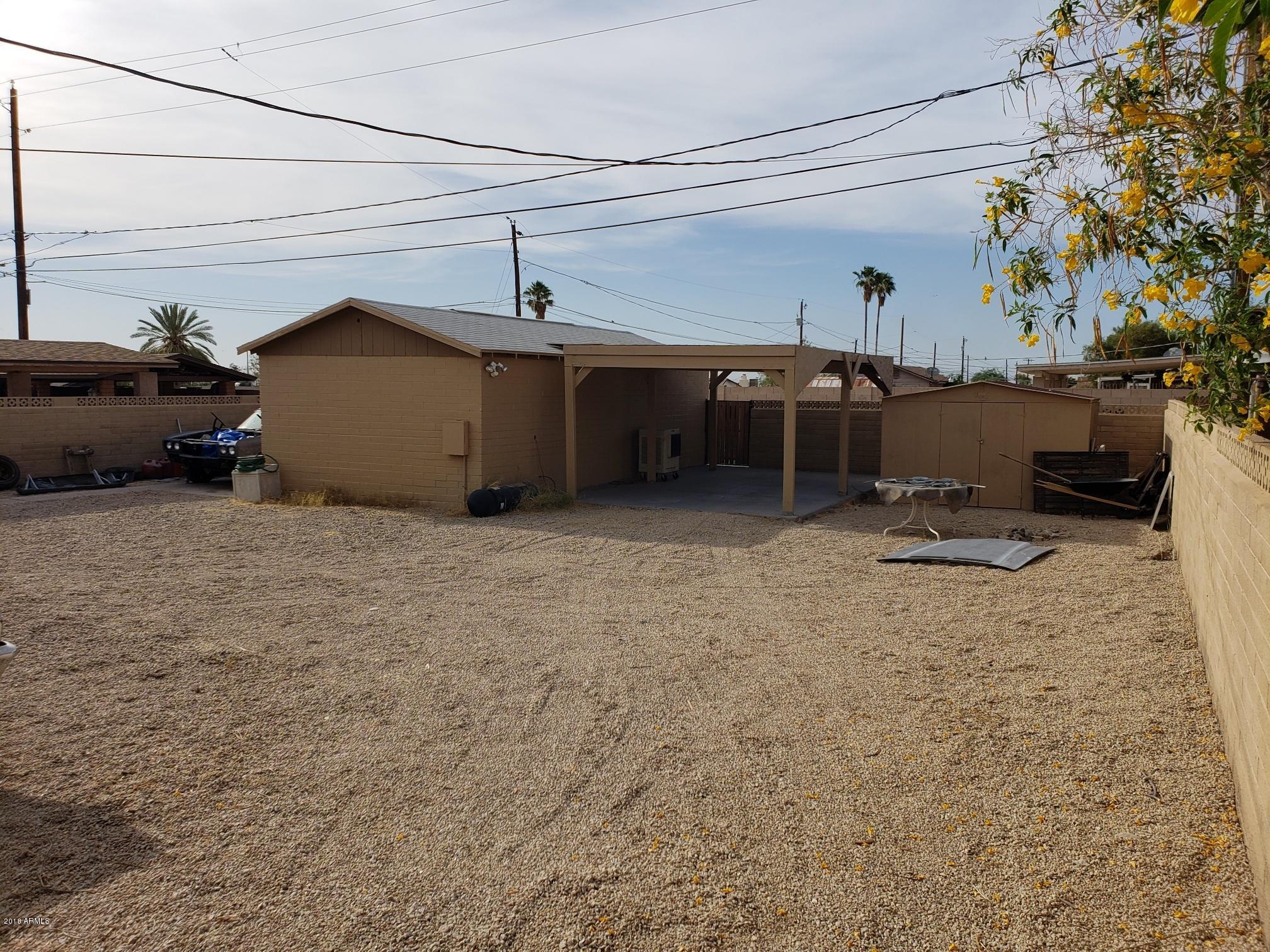 334 West Piedmont Road Phoenix, AZ 85041 - Photo 23 of 36 Garage with Carport