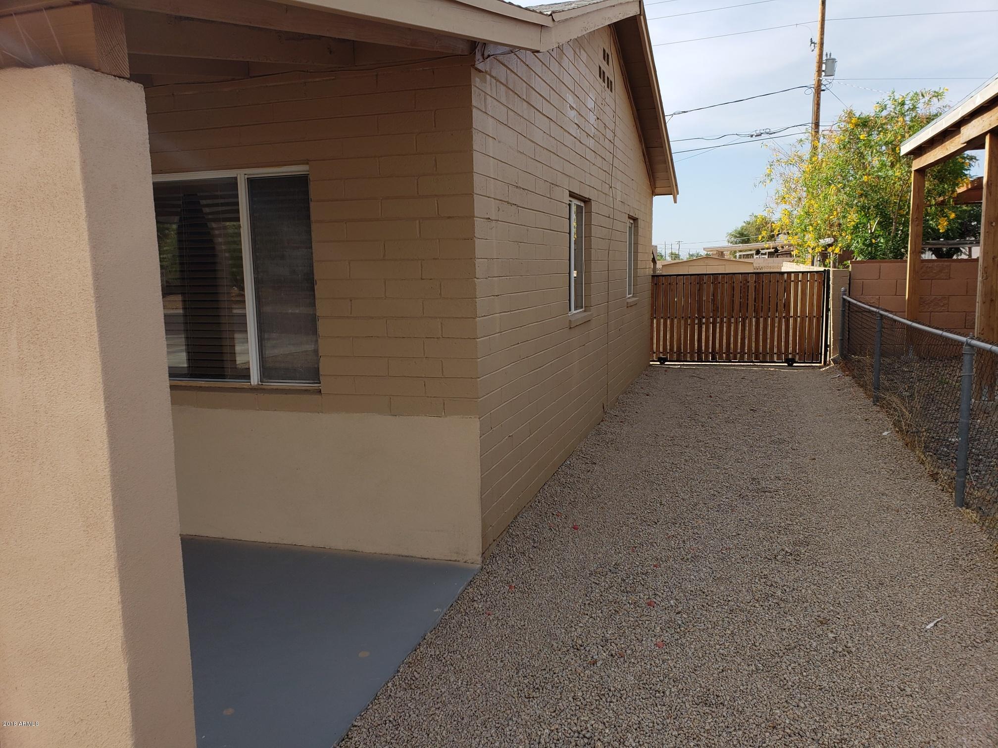 334 West Piedmont Road Phoenix, AZ 85041 - Photo 24 of 36 Side yard with RV Gate