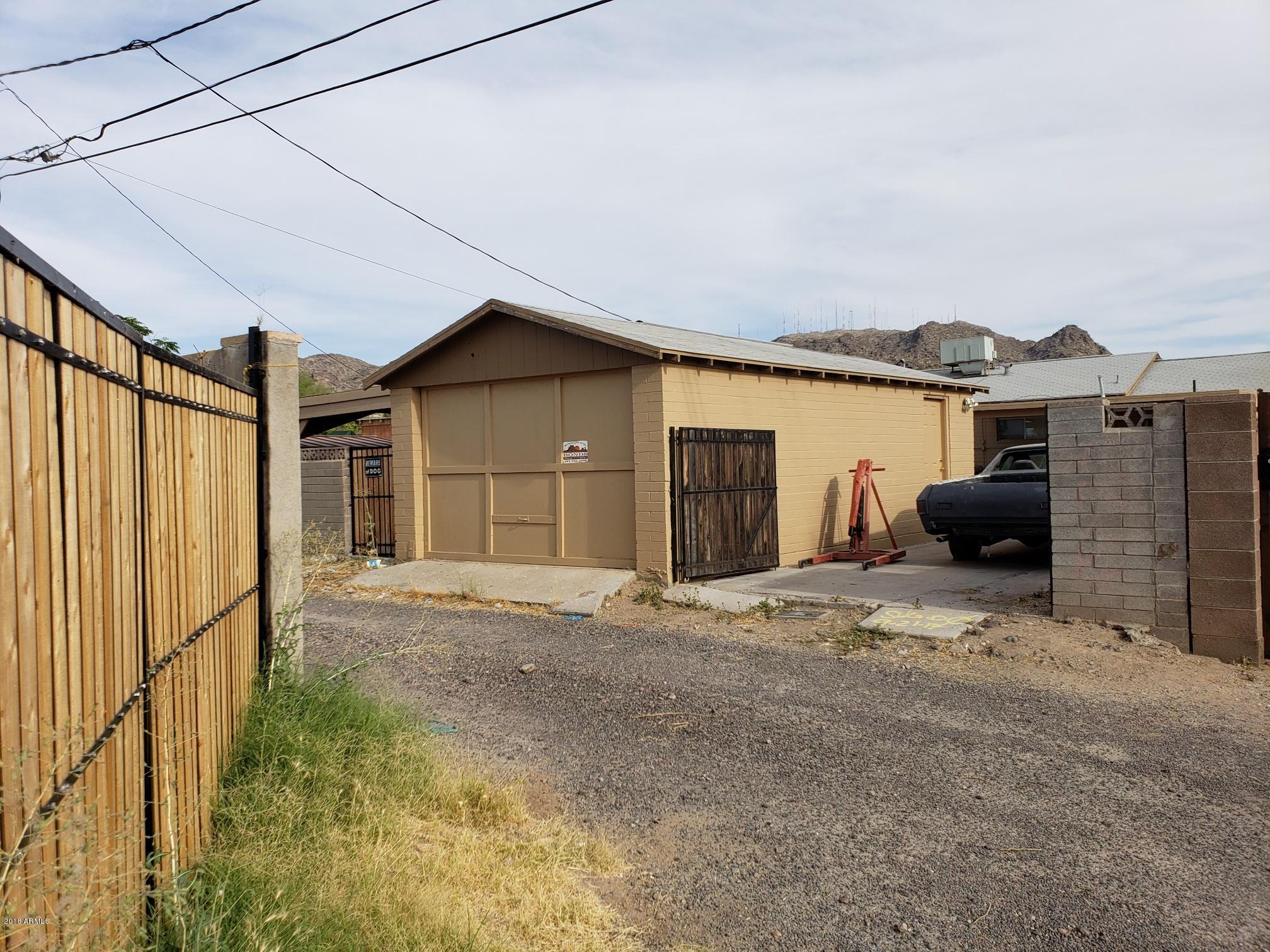 334 West Piedmont Road Phoenix, AZ 85041 - Photo 27 of 36 Back Alley Access to Garage